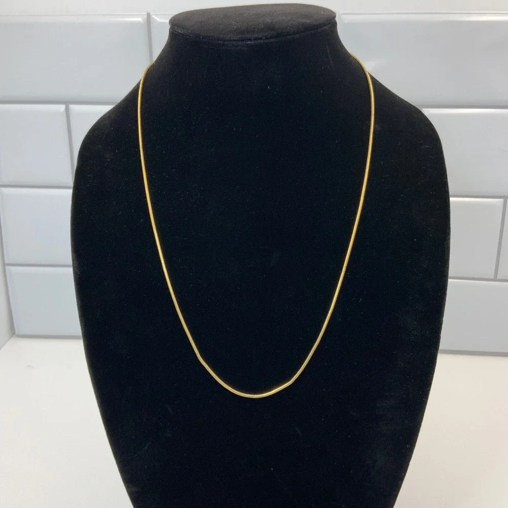 Trifari Vintage Gold Tone Snake Chain Necklace 23 Inch Round Link T Logo Charm